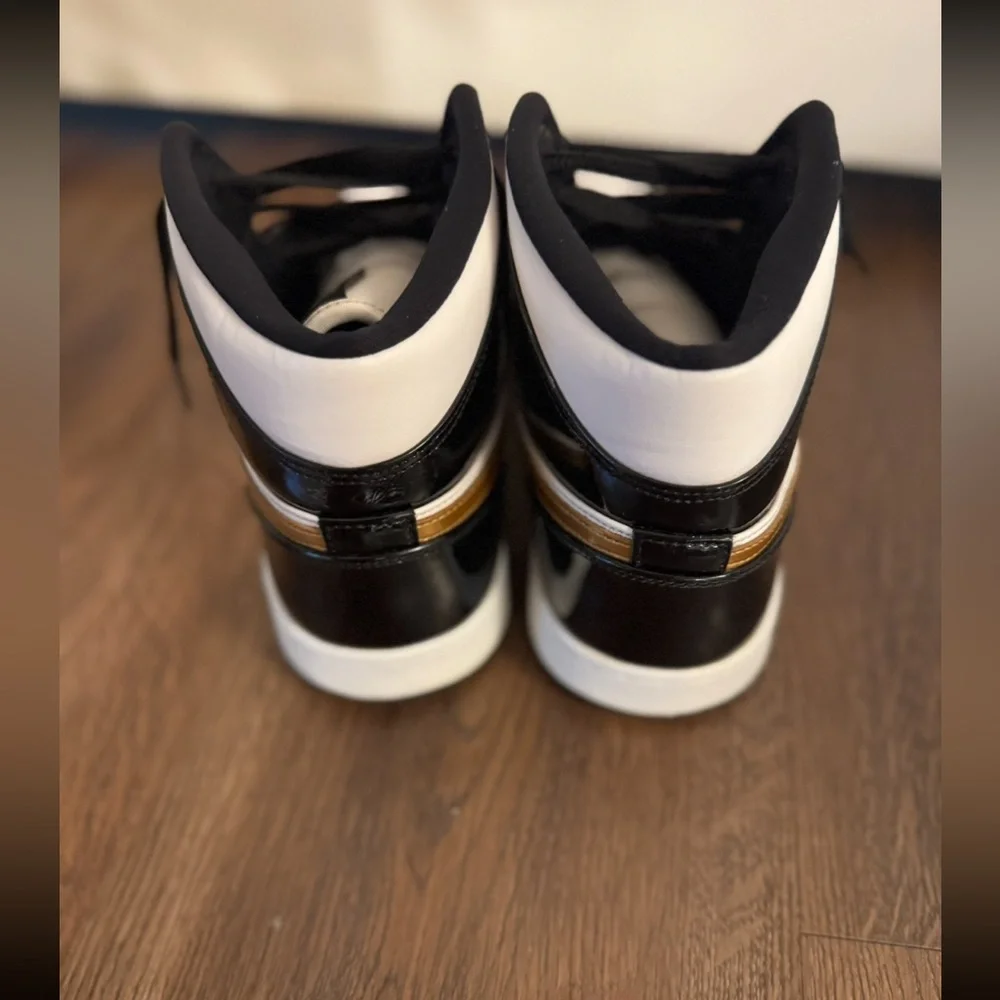 Jordan 1’s Black and Gold High-Top Sneakers